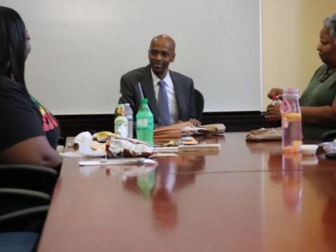 Dean Patterson having lunch with COAS stakeholders