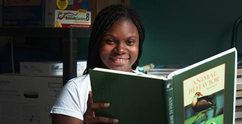 Female Student Reading a Book