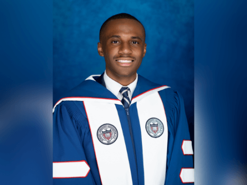 Marquis Taylor dressed in Board of Trustees Attire