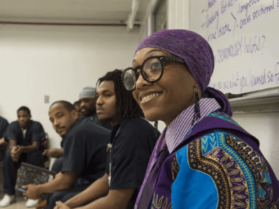 Professor Muhammad teaching Incarcerated Students