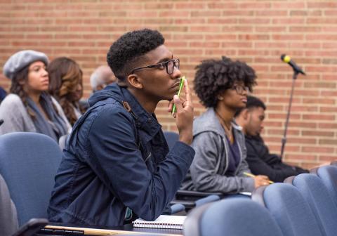 Students in Cramton Auditorium listening to speaker's presentation