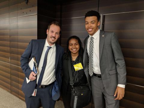 Scholars and Students at a Conference