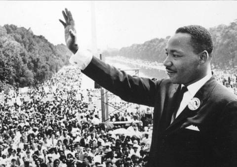 Martian Luther King Jr. waving to protesters during a speech in Washington d.c.